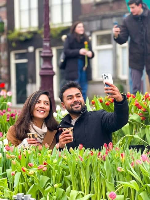 Amsterdam: Premium Tulip Boat Canal Tour - Weather in Amsterdam: Covered Boats, Rebooking, and What You Can Do
