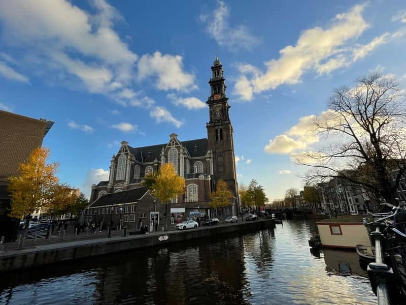 Amsterdam: Private Anne Frank and Jewish History Tour - Dam Square and Westerkerk: the lead-in you will appreciate at the finish