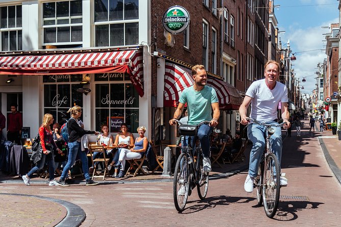 Amsterdam PRIVATE Bike Tour With Locals: Bike & Local Snack Included - Why this private bike tour beats the usual sightseeing shuffle