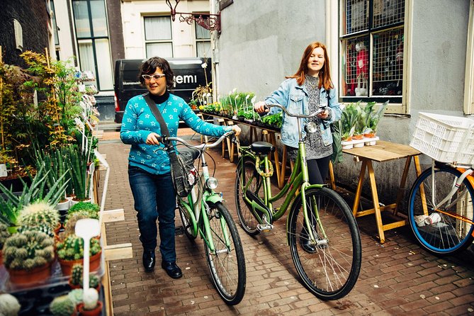 Amsterdam PRIVATE Bike Tour With Locals: Bike & Local Snack Included - Westerkerk stop: a quick church moment with big-city context