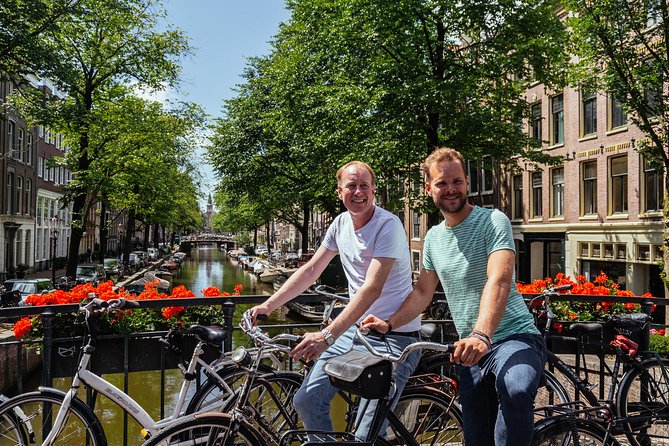 Amsterdam PRIVATE Bike Tour With Locals: Bike & Local Snack Included - Magere Brug (Skinny Bridge): the 15-minute photo break you actually want