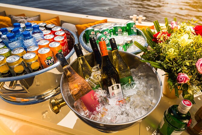 Amsterdam Private Boat Trip with Pizza and Unlimited Drinks - A private canal cruise where pizza and drinks are part of the plan
