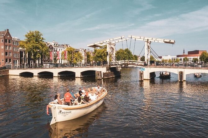 Amsterdam Private Boat Trip with Pizza and Unlimited Drinks - The Hermitage branch and rotating art you can spot from the canals