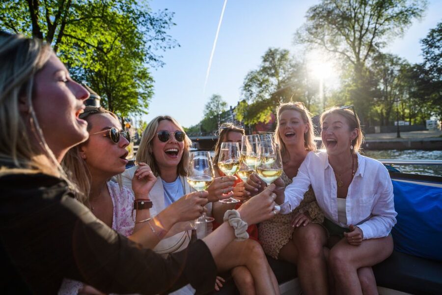 Amsterdam: Private Canal Booze Cruise with Unlimited Drinks - The guide and skipper: making the cruise feel personal