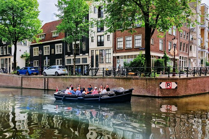 Amsterdam Private Canal Cruise – 90 Minutes through the Old City - Kolksluis and the old harbor stretch, where maritime engineering shows up in stone