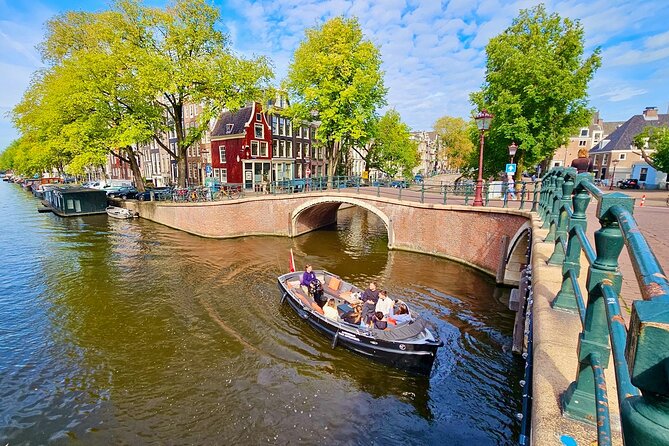 Amsterdam Private Canal Cruise – 90 Minutes through the Old City - Botanical Gardens to the canal belt: Herengracht and the Seven Bridges Canal views