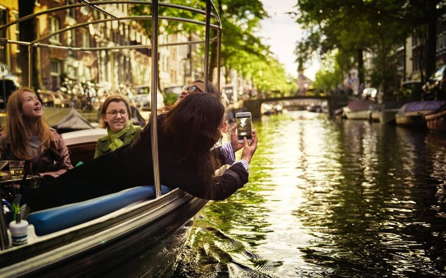 Amsterdam: Private Canal Tour - Why a private electric canal boat feels better than the big-boat cruise