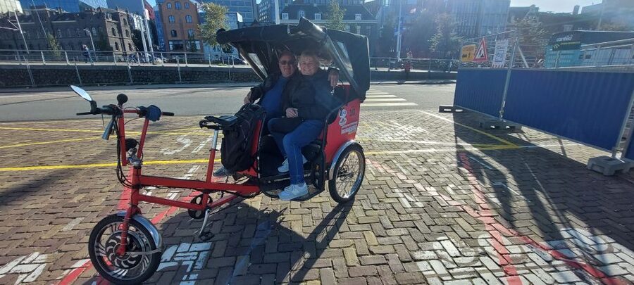 Amsterdam: Private City Highlights Tour by Rickshaw - Dam Square to Red Light District: Fast Orientation, Real Street Detail