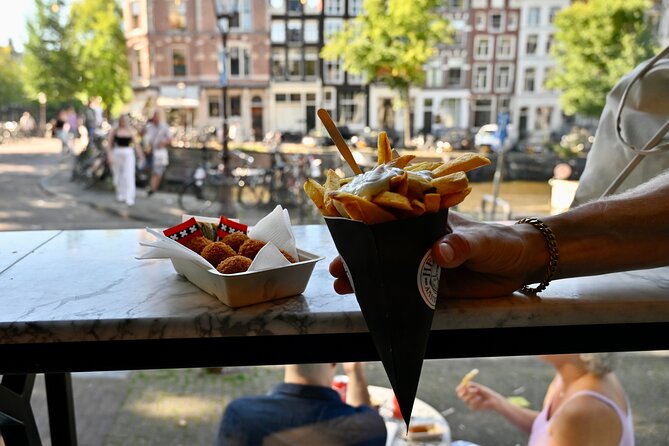 Amsterdam Private Food & Drinks Tour by UNESCO Canals & Jordaan - Café Hegeraad, the oldest canal Singel, and the Jordaan you actually want
