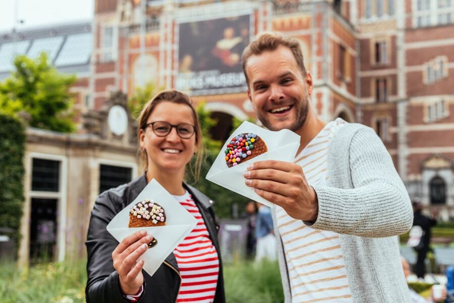 Amsterdam: Private Food Tour with a Local - The big market stop, where snack culture beats museum culture