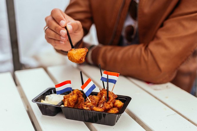 Amsterdam Private Food Tour with Local Including 6 or 10 Tastings - De Pijp and the Banksy Connection: Lunch-Table Vibes, Local Drinks