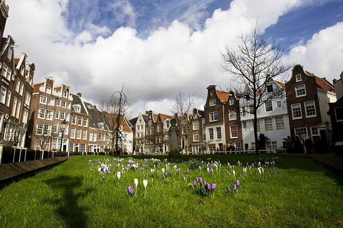 Amsterdam Private Historical Walking Tour - Bloemenmarkt: the largest floating flower market in the world