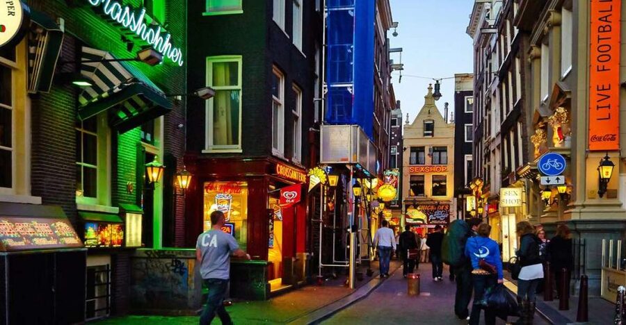 Amsterdam: Private Red Light District and Food Tour - The Walk Itself: Dam Square, Oude Kerk, and the Narrowest Stops