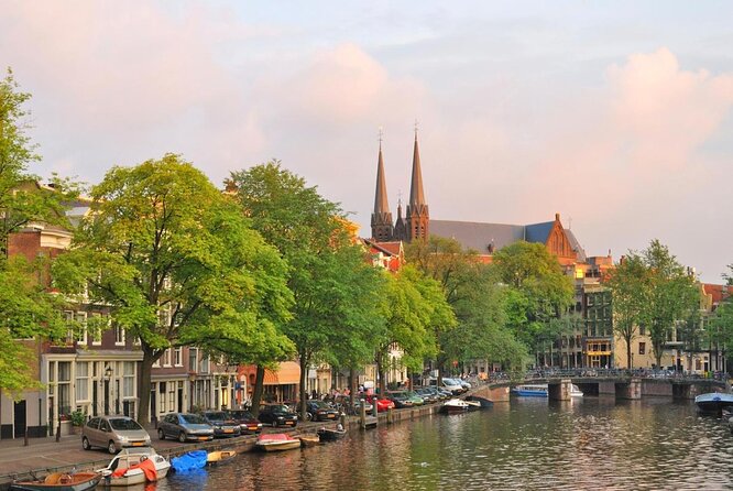 Amsterdam: Private Romantic Evening Canal Cruise + Bubbles/Snacks - Key Highlights