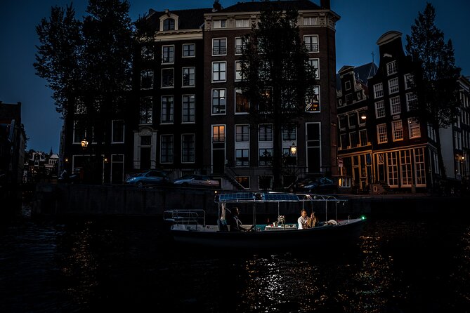 Amsterdam: Private Romantic Evening Canal Cruise + Bubbles/Snacks - Skinny Bridge: Hundreds of Lights, Close-Up Feel