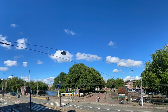 Amsterdam Private Walking Tour with Dinner Experience - The canal ring walk: Herengracht, Keizersgracht, Prinsengracht, and the peaceful heart inside the center