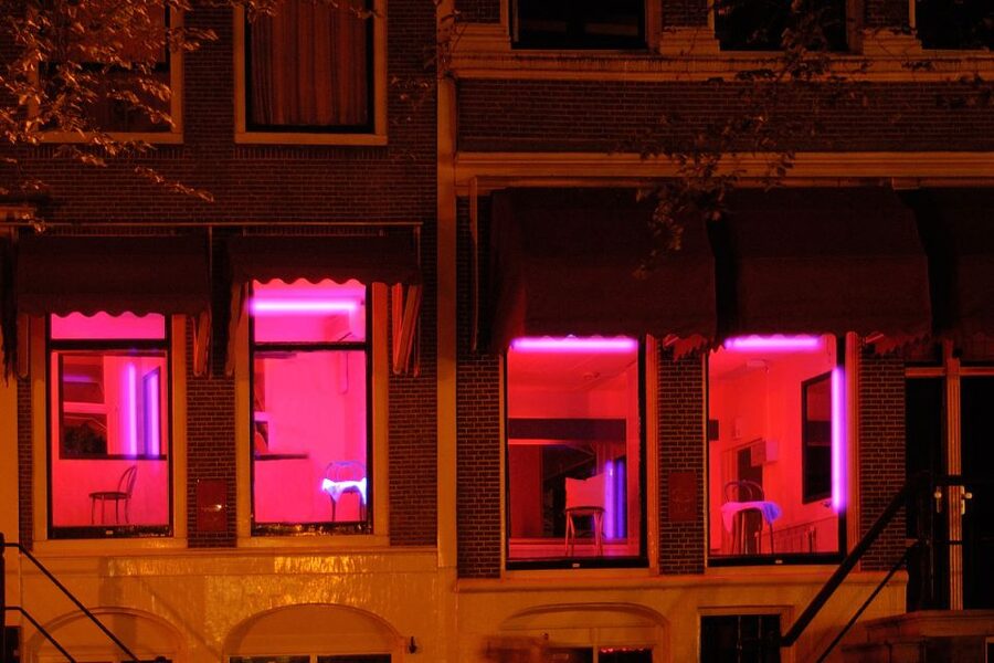 Amsterdam: Red Light District 1-hour Smartphone Audio Tour - Oude Kerk and Belle: seeing the neighborhood through institutions