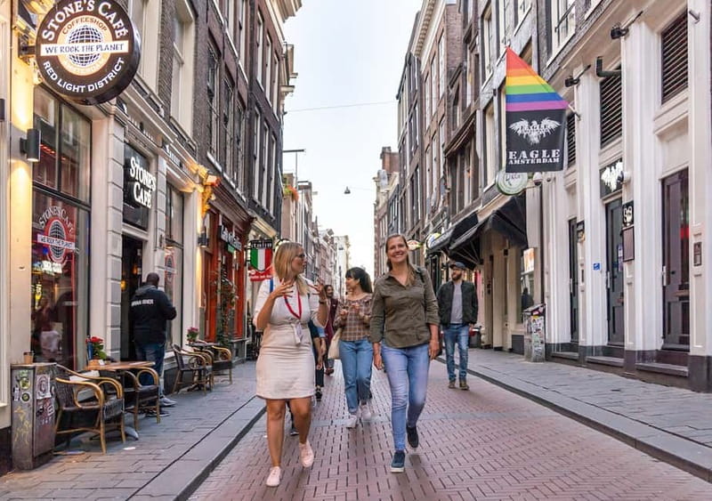 Amsterdam: Red Light District Tour in DE/EN/IT/ES/FR - Coffeeshop Politics at The Jolly Joker, Without Going Inside