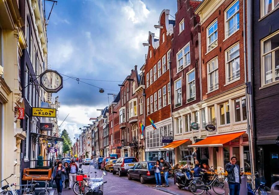 Amsterdam: Red Light District Tour in English or German - Red-lit windows, neon signs, and the legal reality behind what you see