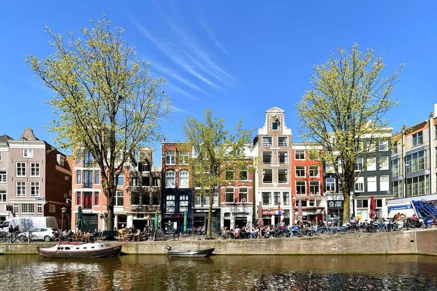 Amsterdam: Red Light District Tour in English or German - Finding Amsterdam’s narrowest street and the first coffeeshop