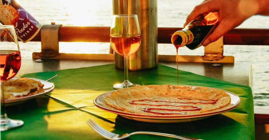 Amsterdam: River Cruise With All-You-Can-Eat Dutch Pancakes - Boarding: What the Boat Feels Like and How the Food Runs