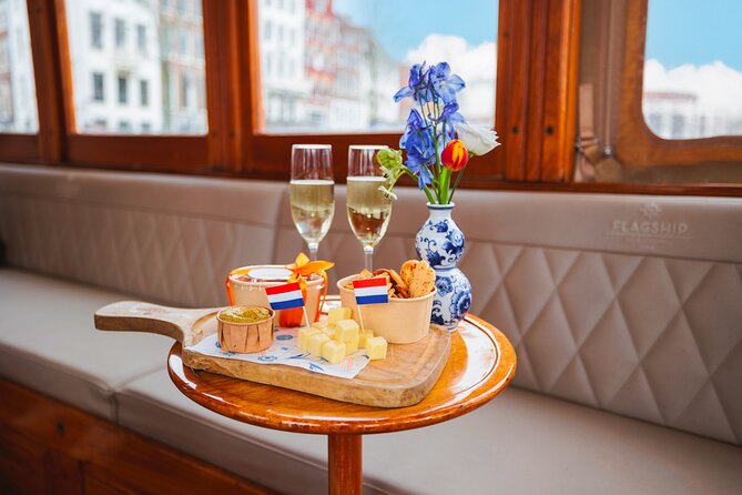 Amsterdam: Romantic Canal Cruise with Optional Bubbles & Bites - Blauwbrug, Hermitage Amsterdam, and the feeling of history from the canal