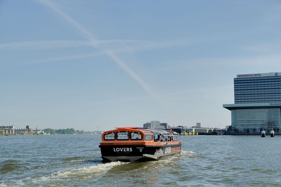 Amsterdam: Semi-Open Canal Boat Cruise - Seats, sound, and photos: the hour passes fast