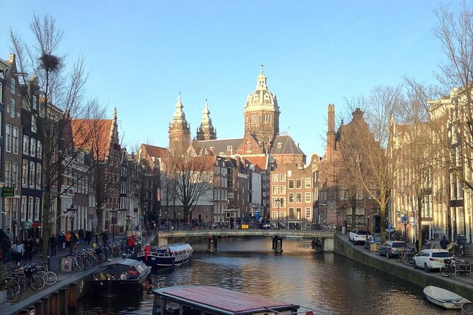 Amsterdam Sightseeing Tour + Hidden Gems + Tastings + PDF guide - Spui herring tip and Begijnhof calm, a smart rhythm break