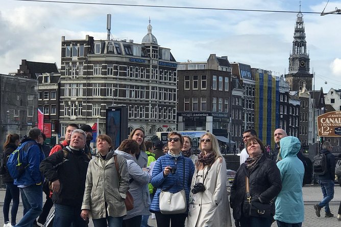 Amsterdam Sightseeing Tour + Hidden Gems + Tastings + PDF guide - Damrak tastings of Dutch cheese and stroopwafels that actually teach you