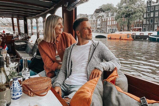 Amsterdam Small-Group Bike Tour With Canal Cruise, Drinks, Cheese - De Gooyer Windmill, ARTIS Zoo Outskirts, and the Narrowest Bridge Crossing