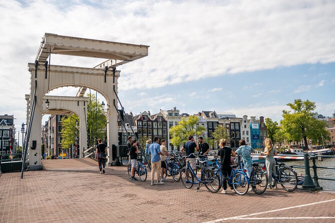 Amsterdam Small-Group Bike Tour With Optional Canal Cruise - Passing De Gooyer Windmill Without Detouring Off the Main Plan