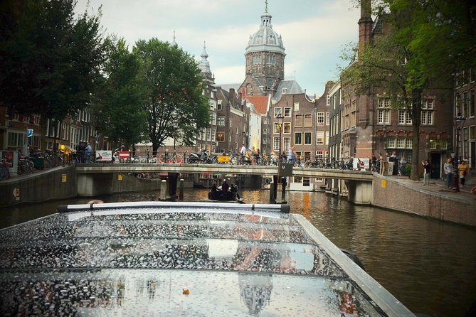 Amsterdam Small-Group Canal Cruise Including Snacks and Drinks - Amstel and canal-ring landmarks, including the Red Light District area