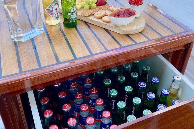 Amsterdam Small-Group Canal Cruise Including Snacks and Drinks - The food and open bar: bitterballen, stroopwafels, cheese, and jenever