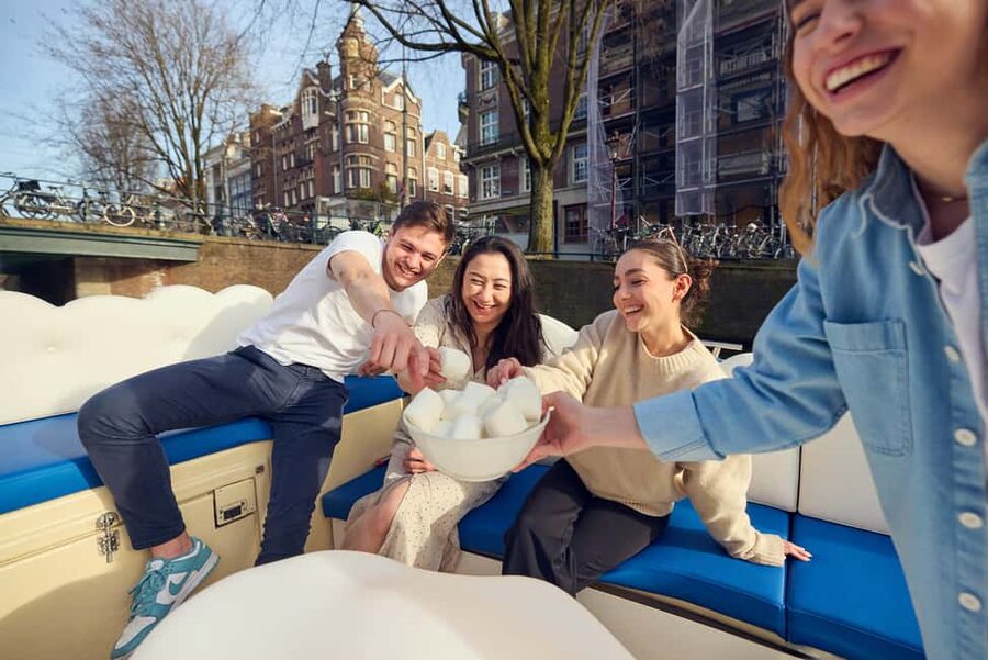 Amsterdam: Smoke & Cruise on covered Cannabis Boat With Bar - Comfort in rain or cold, and what to pack