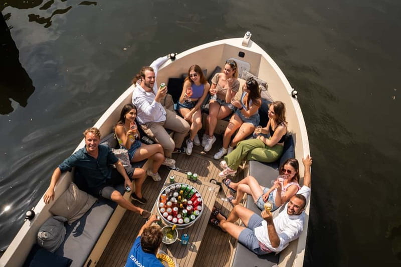 Amsterdam: Spanish Guided Open Boat Cruise with Bar Onboard - The Canal Belt and Herengracht: Grachtengordel Views From the Water