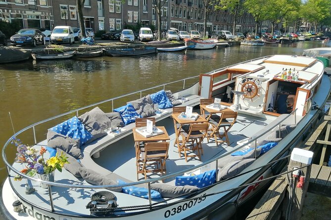 Amsterdam: The Bulldog Boat Smoke-Friendly Cruise & 2 Drinks - The Half-Open Boat Reality: Cozy Tips for Windy, Cold, or Rainy Weather