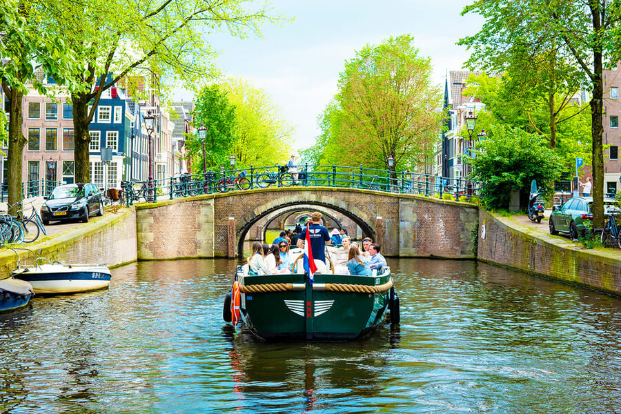 Amsterdam: The Newest Canal Cruise with Drink Option - Montelbaanstoren to Oudeschans, the canals that feel like Amsterdam