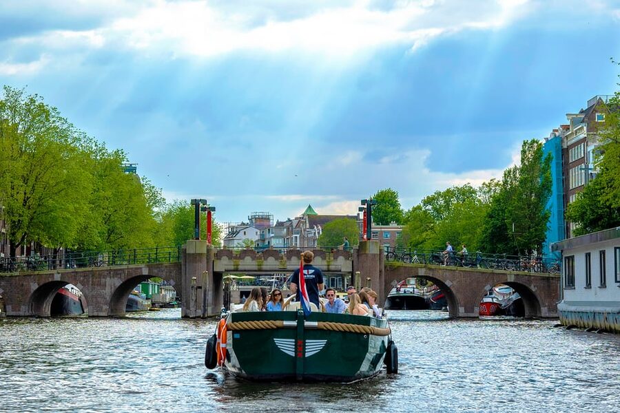 Amsterdam: The Newest Canal Cruise with Drink Option - Optional drinks and the cozy boat factor on real-weather days