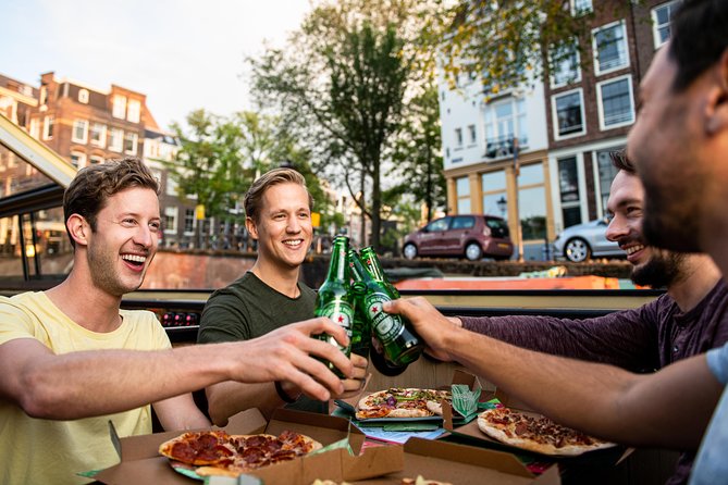 Amsterdam The Original Pizza Cruise with Unlimited Drinks - Canals by night: from Centraal Station to the UNESCO canal belt
