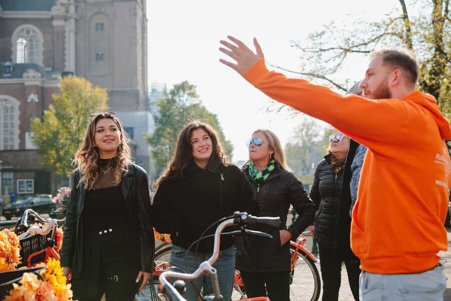 Amsterdam: Top Highlights Guided Bike Tour - Meeting at Nieuwezijds Voorburgwal 101, Just Steps from Central Station