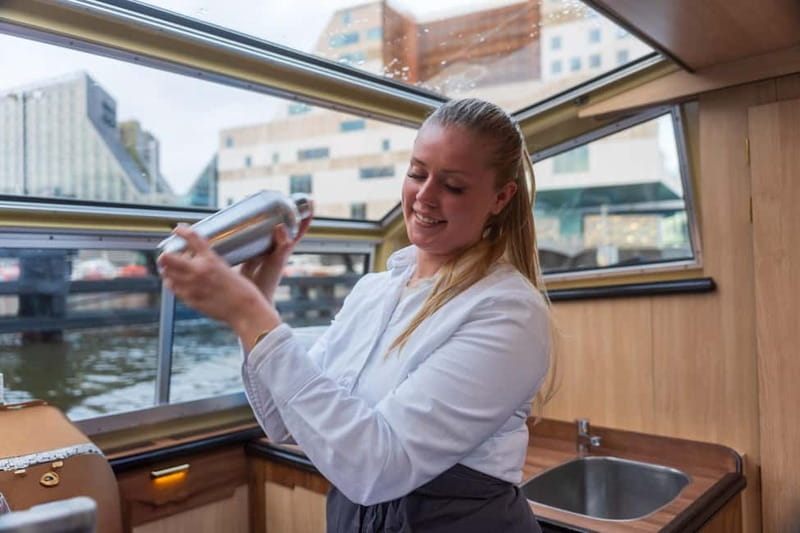 Amsterdam: Unlimited Cocktails Cruise on the Canals - From Damrak Pier to UNESCO Canals in 75 Minutes