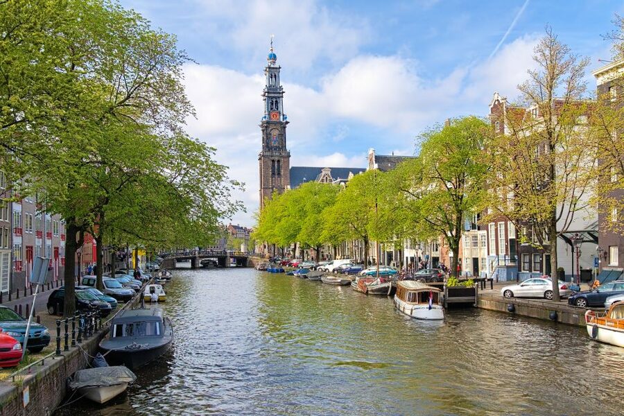 Amsterdam Walking Tour and Canal Cruise - Dam Square, Royal Palace Views, and a Serious Dutch Reminder