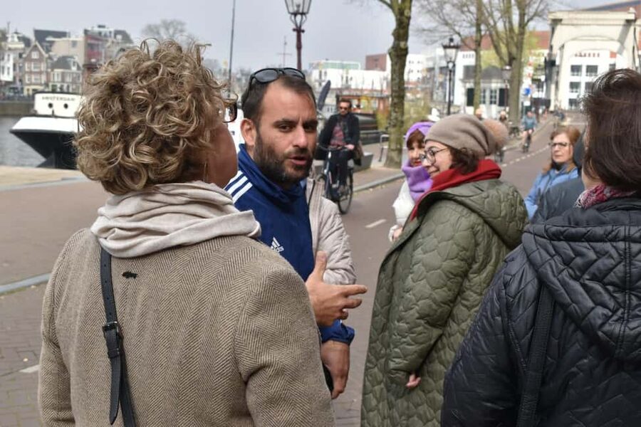 Amsterdam Walking Tour:Anne Frank, History & Liberal Culture - Bridges, leaning houses, and the stories hiding under the canals