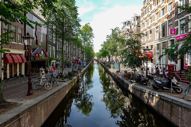 Amsterdam Walking Tour: Explore the Red Light District - Café the Schreiertower: Where Sailors’ Wives Watched for News