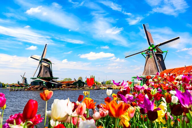 Amsterdam: Windmills, Cheese and Volendam Tour with Video Guide - Volendam on the IJsselmeer: Fishing Village Vibes and Easy Wandering