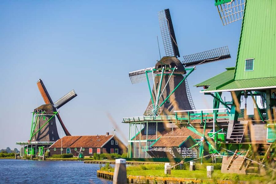 Amsterdam: Zaanse Schans, Marken, Volendam, & Edam Day Tour - Meeting at De Ruijterkade 34A and Timing the Day