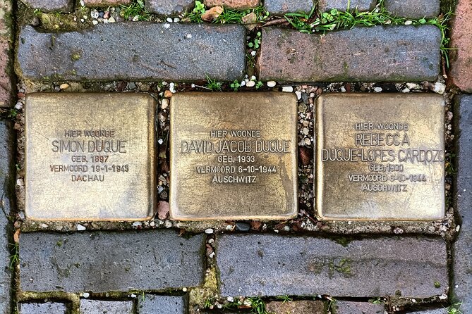Anne Frank and Amsterdam Jewish History Walking Tour - Stop 1: Dam Square memorial, a WWII starting point in public view
