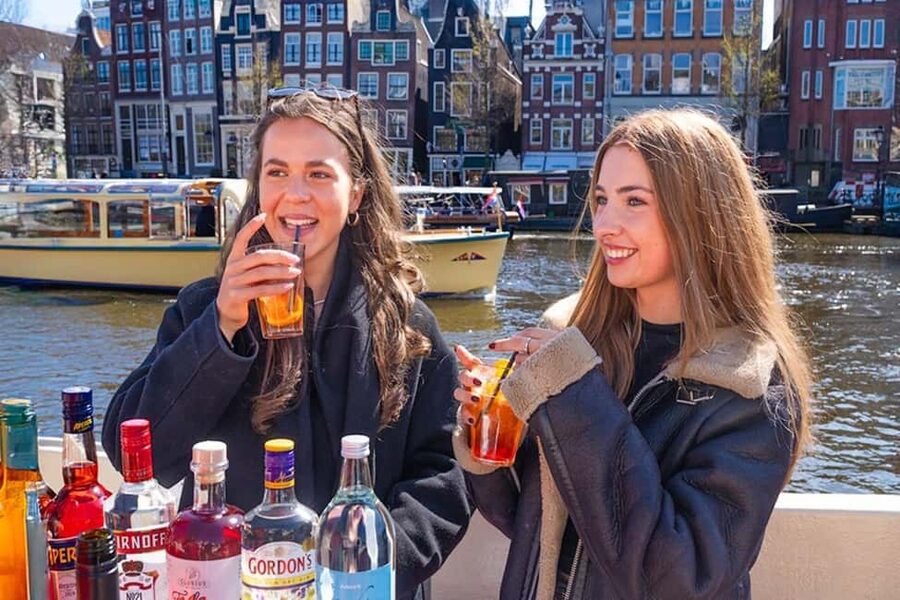 Cheese & Drinks Guided Amsterdam Boat Tour, All Inclusive - Route walkthrough: what you’ll see from Oudezijds Voorburgwal to the return