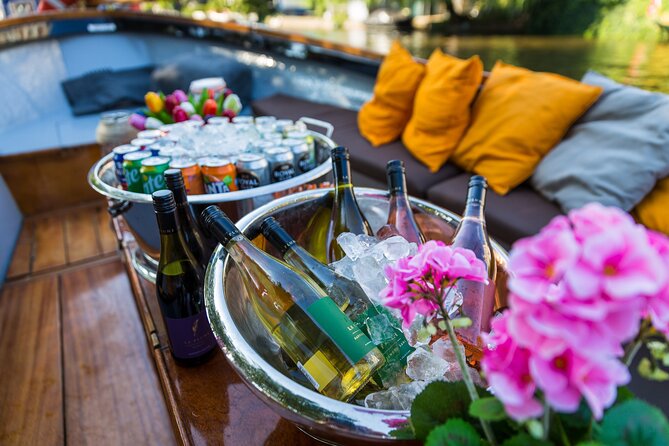 Classic Salonboat Tour in Amsterdam Including Cheese and Wine - Comfort and photo tips when Amsterdam weather changes its mind