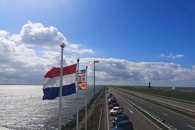 Day Tour Giethoorn, Afsluitdijk and Zaanse Schans with Boat Cruise - Afsluitdijk: World-Scale Dike Engineering and a Short Photo Stop